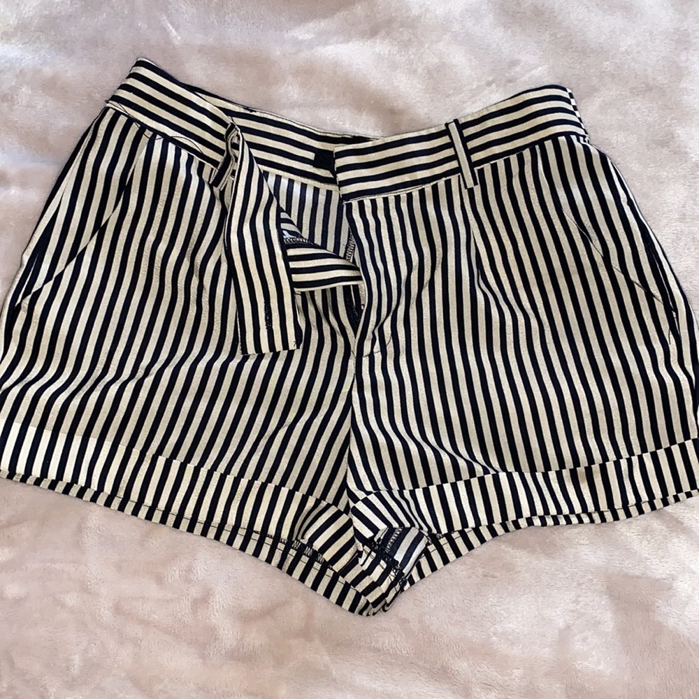Tan and black stripped shorts.